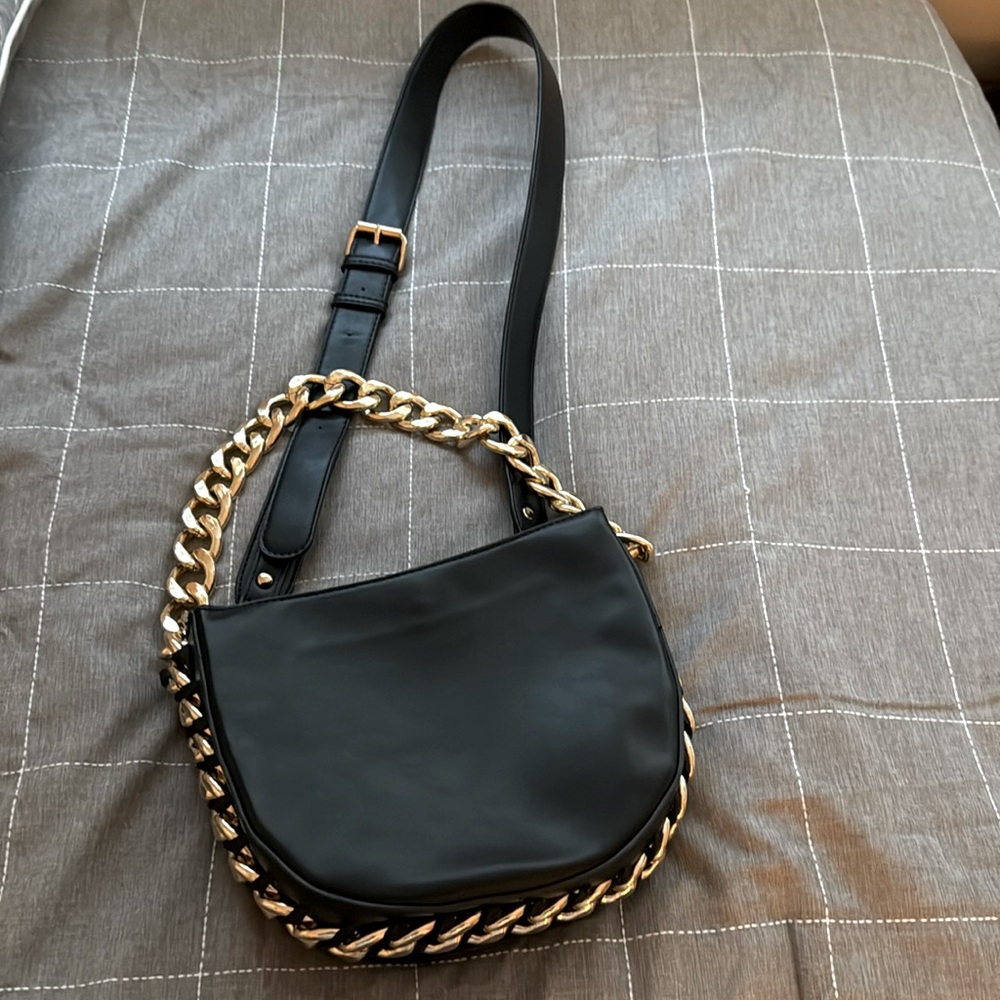 Black crossbody bag with thick gold chain
